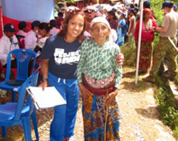 Volunteer of the Month Nurse Sama Shrestha in Nepal with 100 year-old patient.