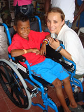 Kendra Dilcher with child in wheelchair