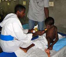 A child receives medical care in Haiti