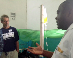 Volunteer Dr. Barry Finette participating in rounds in Cameroon.