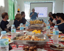 Project HOPE volunteers meet with the governor of Capiz in Tapaz, the Philippines