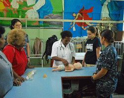Nurses at Saint Mary's Hospital in Kokopo, Papua New Guinea practice and learn updated CPR techniques