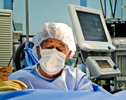 Dr. Baxt performing surgeries onbard the USNS Mercy.