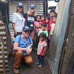 Guatemala team with children