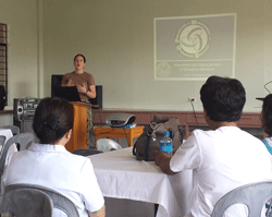 A navy psychiatric nurse gives a seminar on how to deal with a violent patient on Pacific Partnership 2014, Tacloban, the Philippines