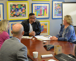 2012 American Idol contestant Jeremy Rosado meets with members of Project HOPE staff at HOPE headquarters in Millwood, VA
