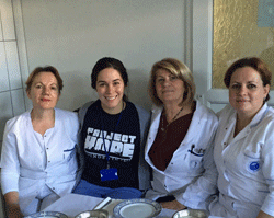 Jessica Fuentes, RN, second from left, Project HOPE's December 2015 Volunteer of the Month
