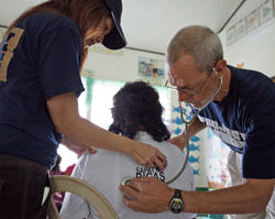 Project HOPE Rotation 3 volunteers treat patients at San Antonio Elementary School on Panay Island, the Philippines