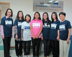 Pfizer Global Health Fellow, Leah Bardfield (center, pink) with Project HOPE Shanghai staff.