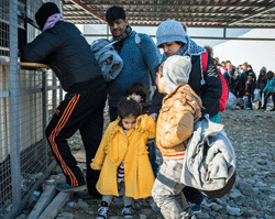 Migrants waiting to enter the Gevgelija Transit Center