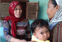 A Community Health Volunteer (kader) in Indonesia