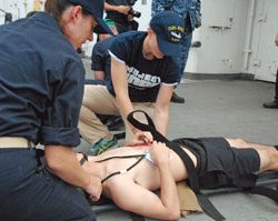 Project HOPE volunteers participate in a mass casualty exercise aboard the USNS Mercy on Pacific Partnership 2015