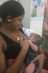 Health workers teach mothers the importance of breastfeeding in Dominican Republic.