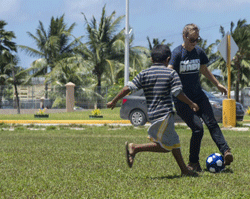 Project HOPE volunteers participated in soccer during the kick-off of Pacific Partnership 2014 in Kupong, Indonesia