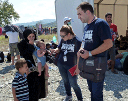 Project HOPE volunteers assist Syrian refugees at the Gevgelija Transit Center in Macedonia