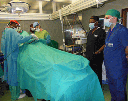 Dr. Filipce observing surgery