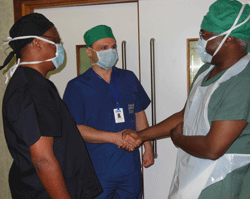 Dr. Filipce meets with surgery staff at Muhimbili