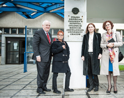Dr. Howe stands outside the Universtiy Children's Hospital, Krakow, where HOPE has been improving children's health for nearly 40 years.