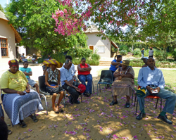 VSL meeting takes place under a tree in South Africa.