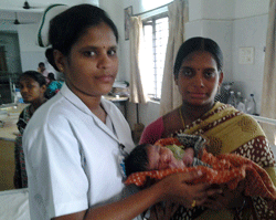 maternity patient and staff at NRI General Hospital maternity