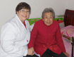 Volunteer Sharon Redding with 96-year-old nursing home resident
