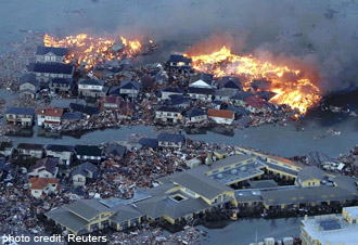 houses in water on first after Japanese earthquake and tsunami
