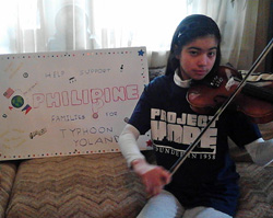 11-year-old Larissa Manrigue uses her violin to help people in the Philippines