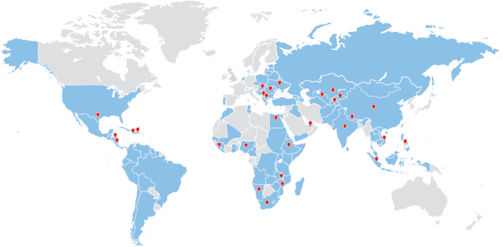 World map with countries highlighted in blue where we operate and red pins dropped in office locations