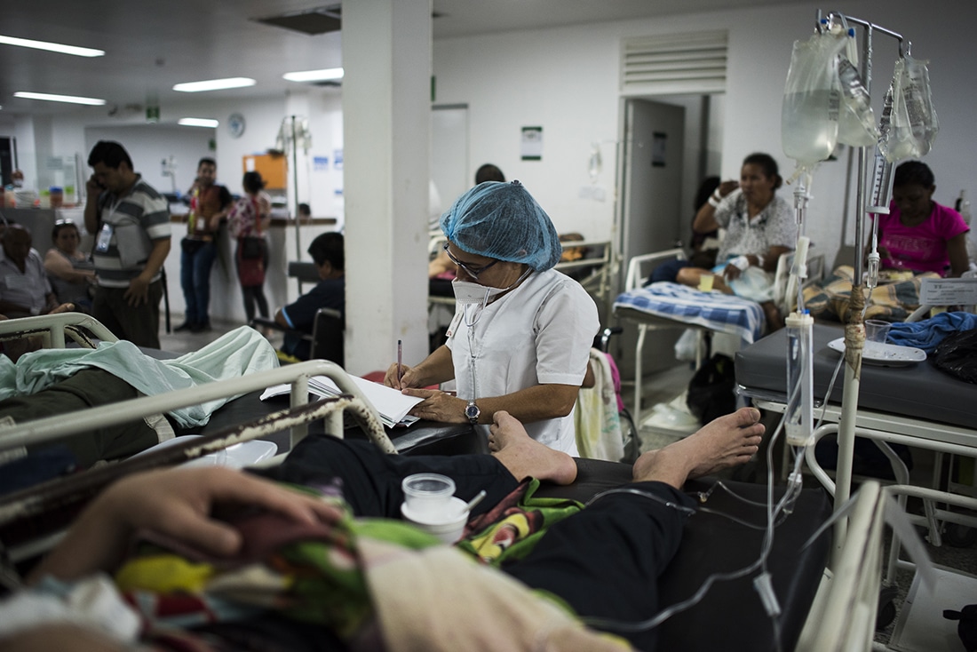 Health care worker treating patients in a hospital in Colombia.