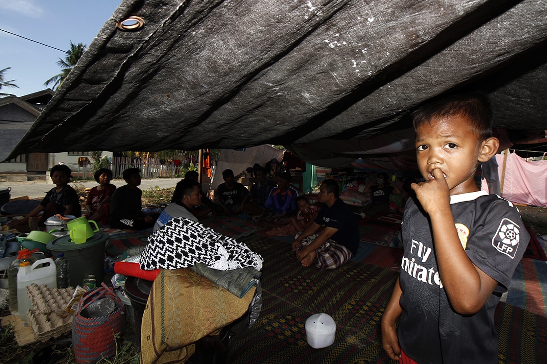 People are staying in tents in Sigi district, Central Sulawesi.