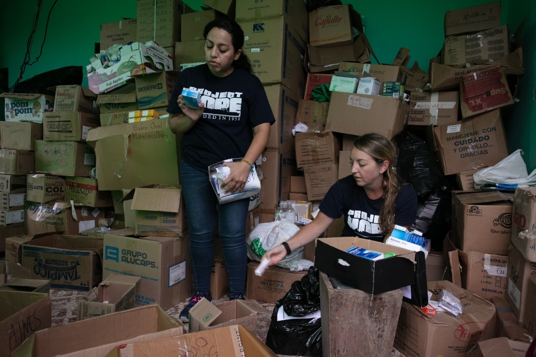 Volunteers organize medical supplies in Guatemala