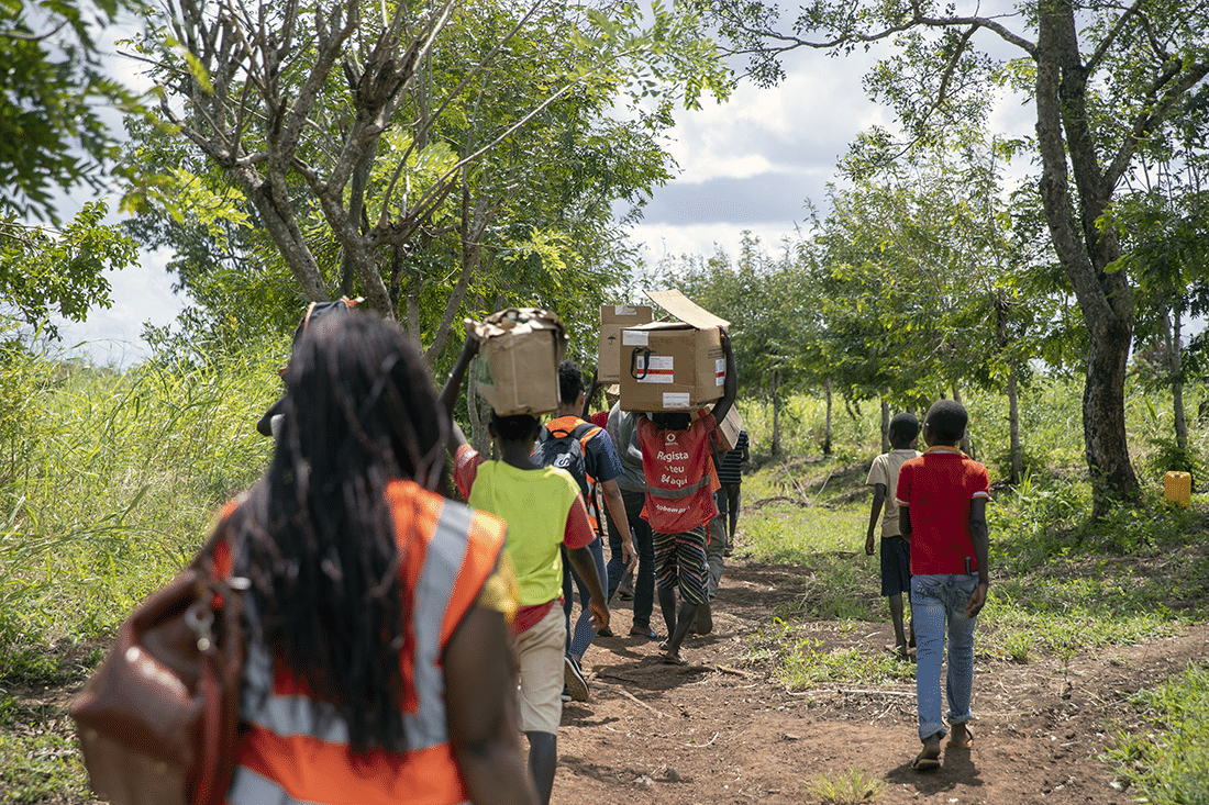 people carrying supplies