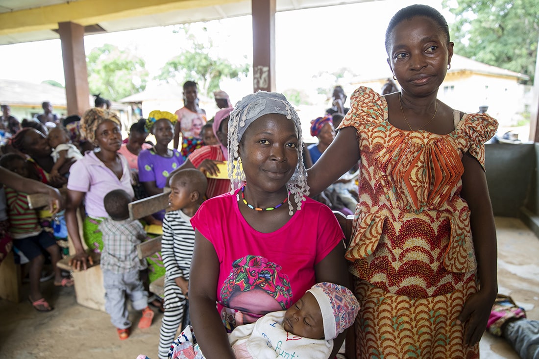 Two women in a mother care group in Sierra Leone