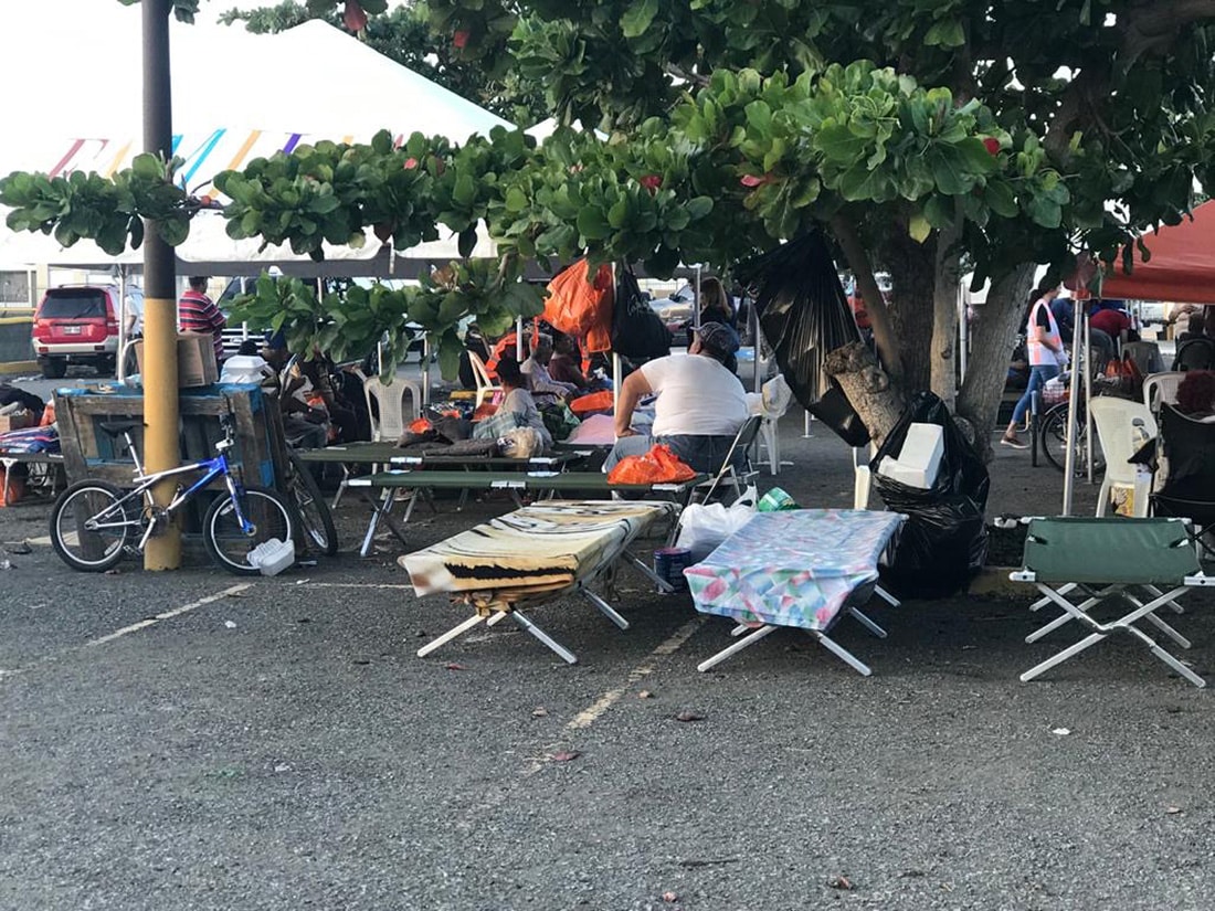 People in Puerto Rico are sleeping on cots outside because they are afraid of aftershocks.