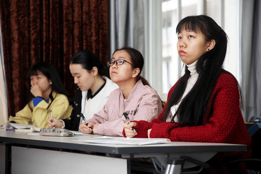 Chinese students sitting in a classroom.