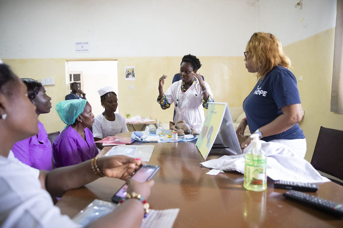 A doctor leads a training in Sierra Leone