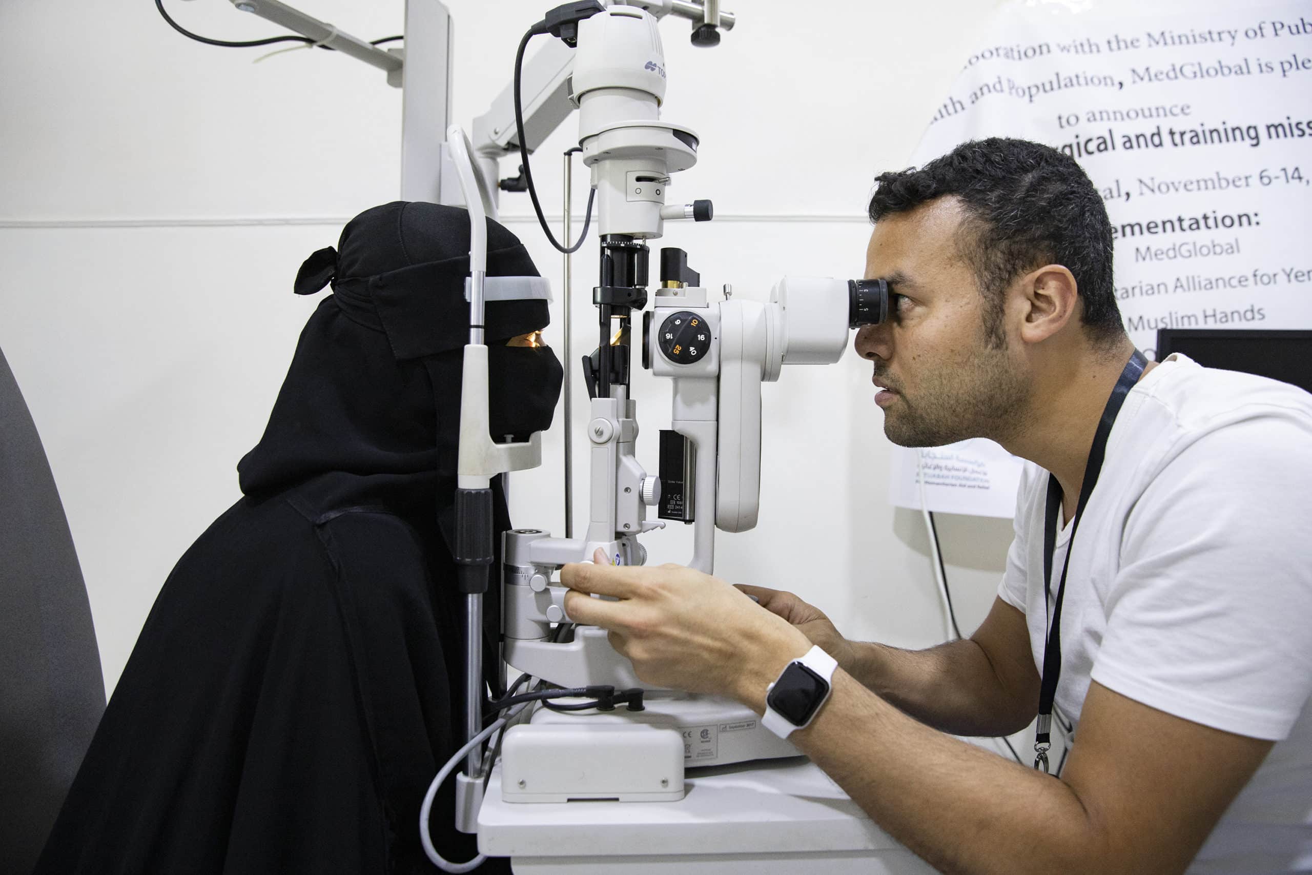Doctor treating patient in Yemen