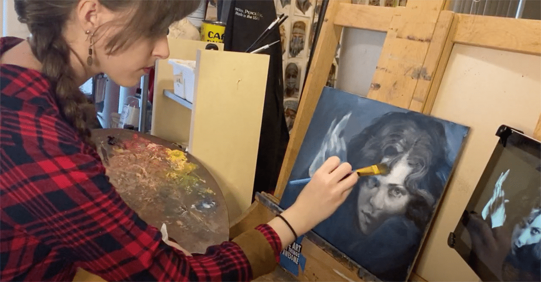 Artist painting a portrait