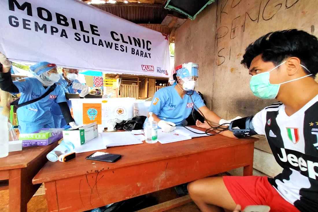 Project HOPE mobile medical clinic consultation