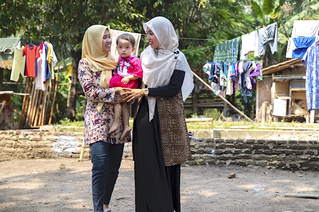 Midwife and mother in Indonesia