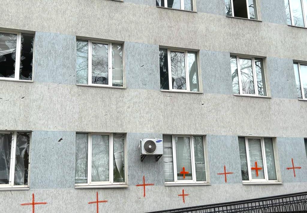 Red crosses painted on the side of a hospital in Irpin, Ukraine