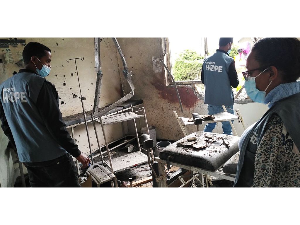 three Project HOPE staff assess damages in hospital in Ethiopia