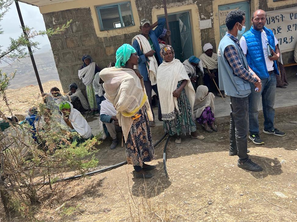 various people standing outside medical center in Ethiopia