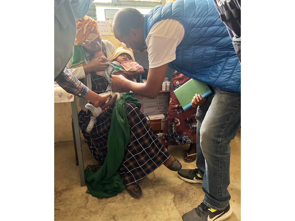 doctor assessing baby in Ethiopia