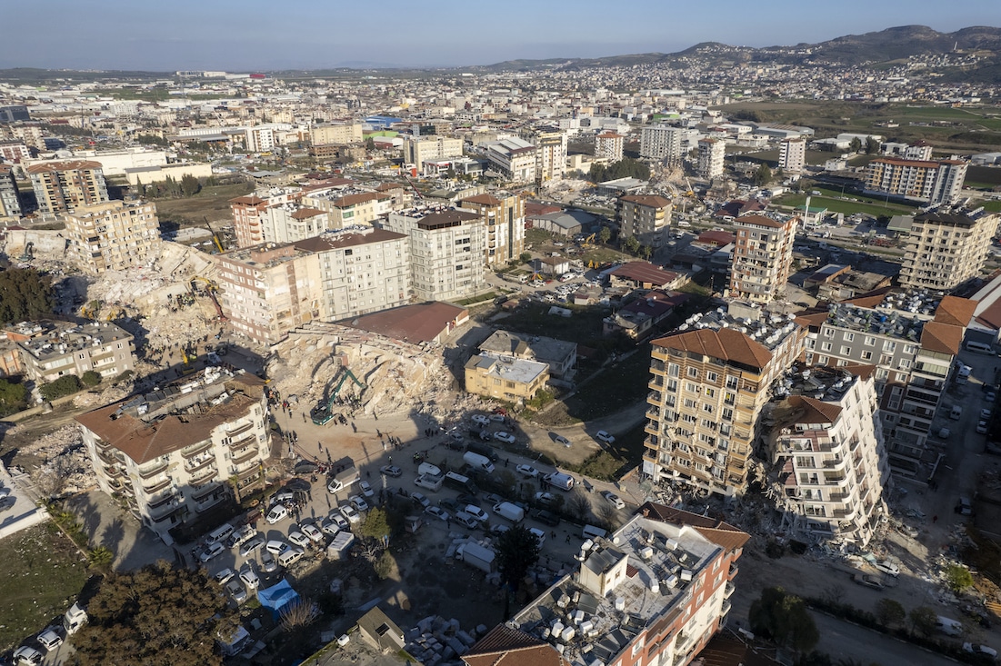 Drone shot of landscape of city in ruins from earthquake in Turkiye.