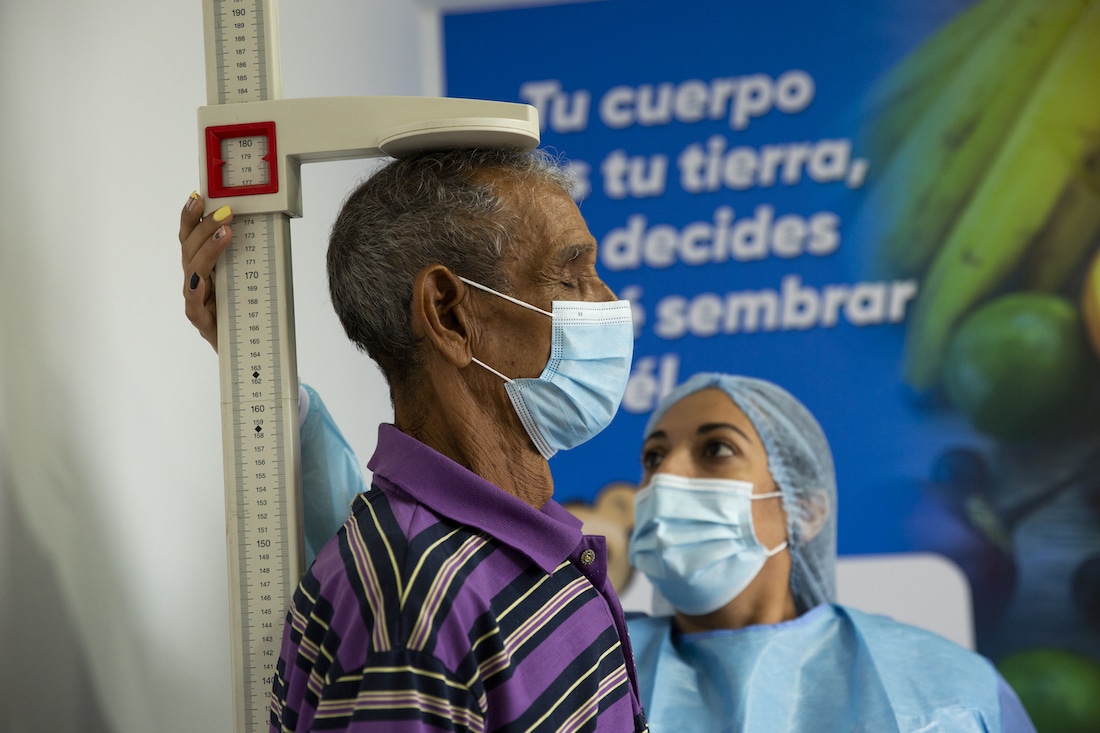 Man receiving health care at a clinic