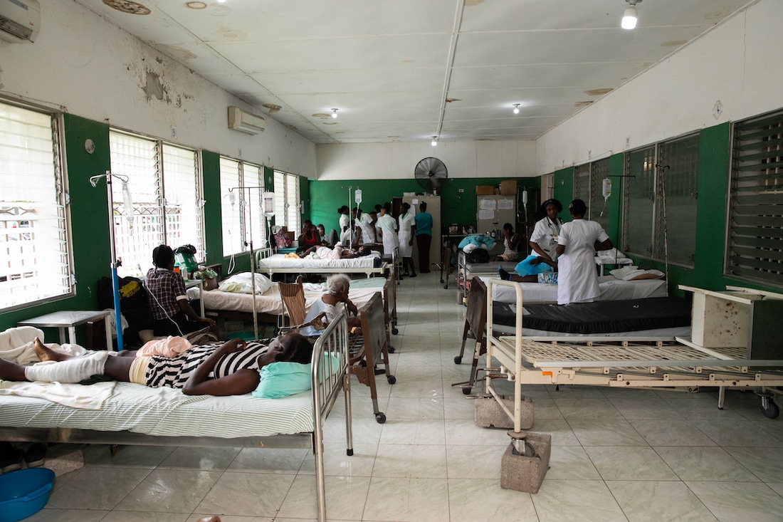 wide shot of hospital beds with patients in Haiti.