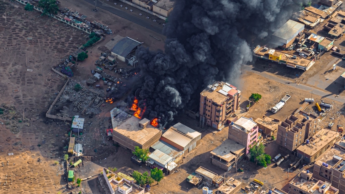 aerial image of a building in Sudan on fire