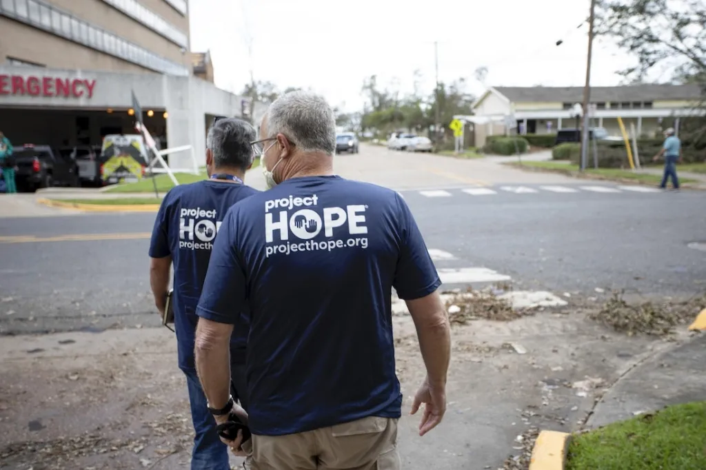 back of man's shirt that says Project HOPE.