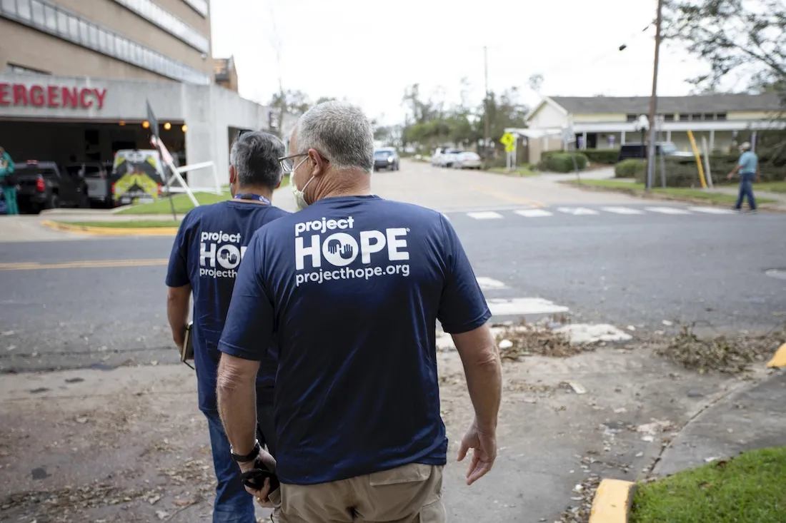 back of man's shirt that says Project HOPE.